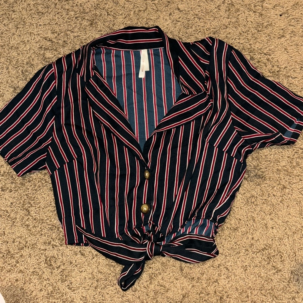 Francesca’s shirt cropped